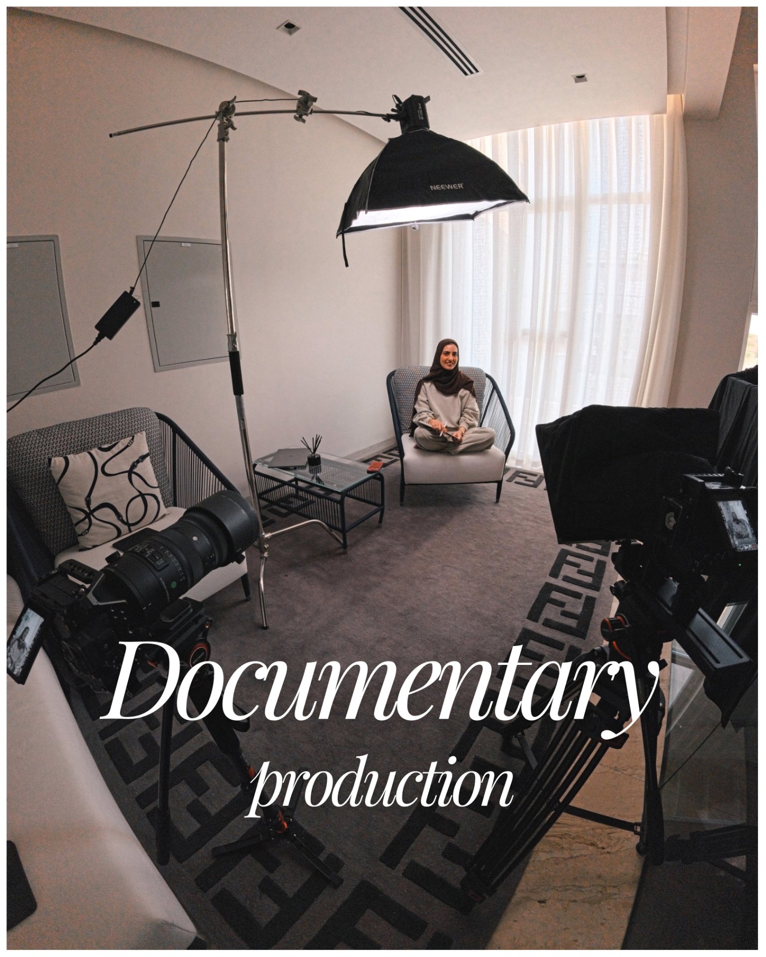 Documentary production — on set, lights up, story rolling.